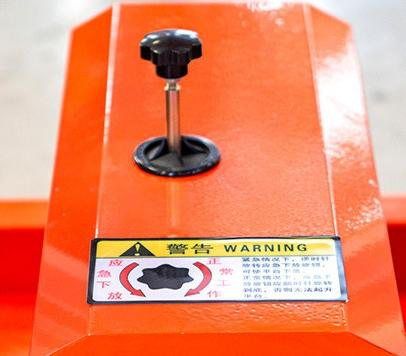 Emergency lower button